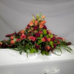 8. Höstlov, Orange liljor, Vinröd nejlika, Orangegula germini, Orange rosor, Texasgräs